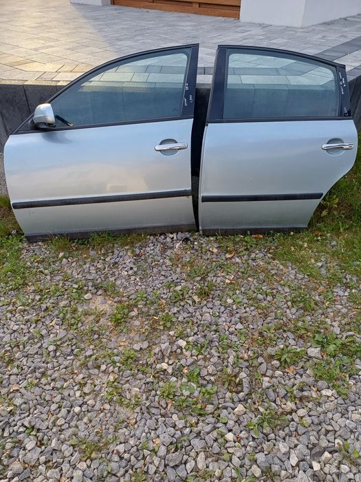 Drzwi VW Passat b5 FL 2002r sedan LA7W srebrny