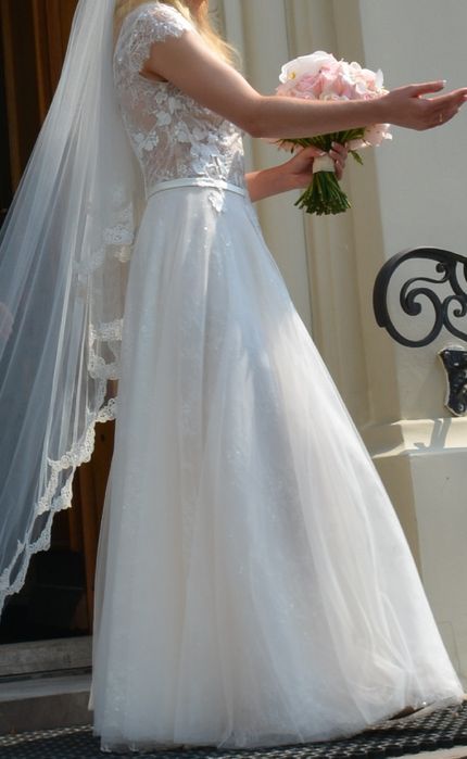 Ślubna suknia Madonna w idealnym stanie