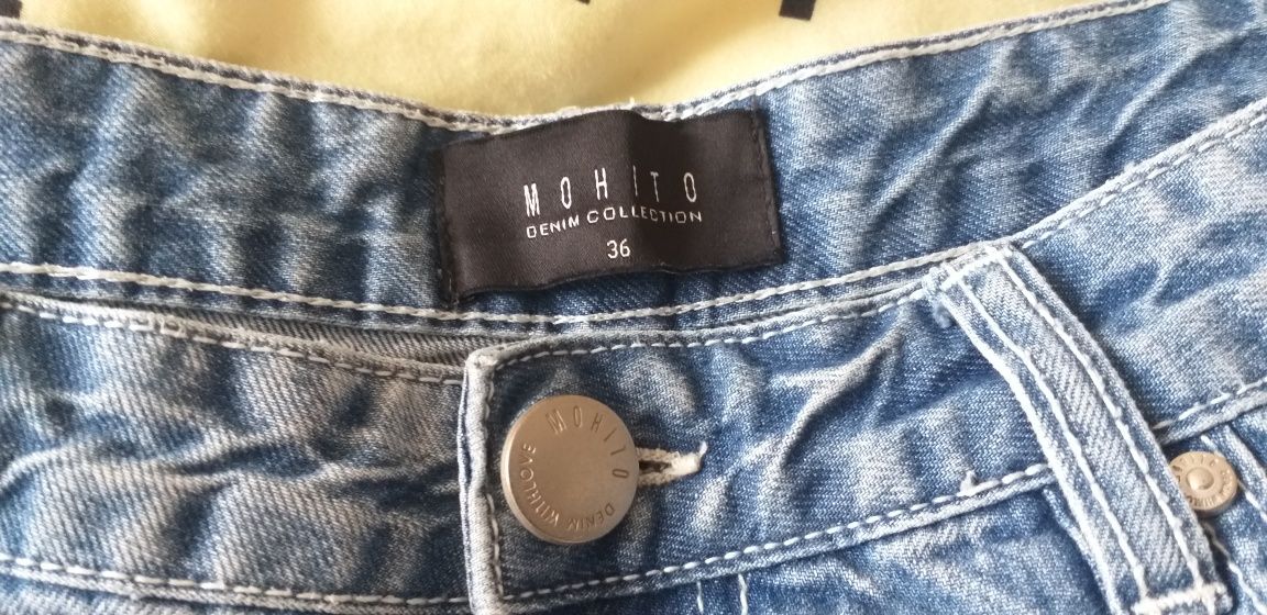 Spodnie jeansowe z dziurami Mohito 36