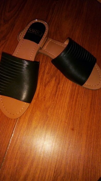 Жіноче взуття фірмове,шкіряне.