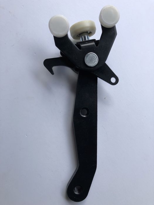 Ролик боковой двери нижний VW Transporter T5