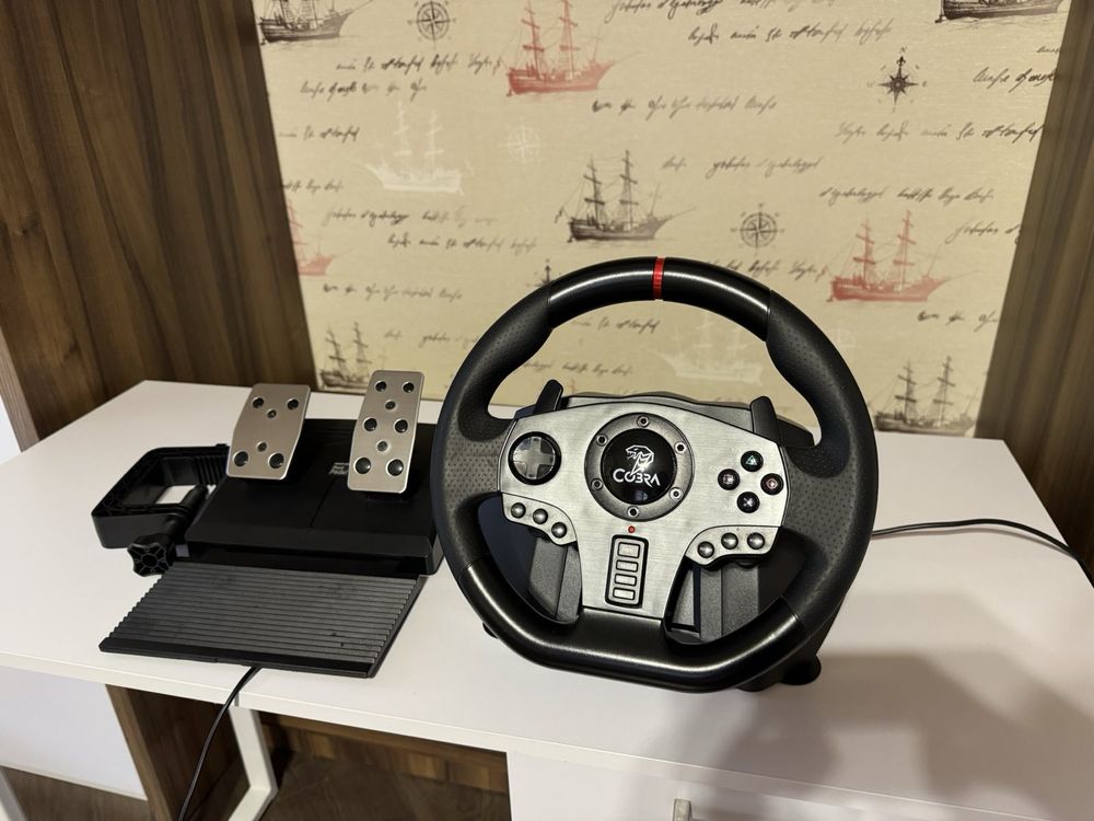 Продам игровой руль Cobra Rally GT 900 в идеальном состоянии.
