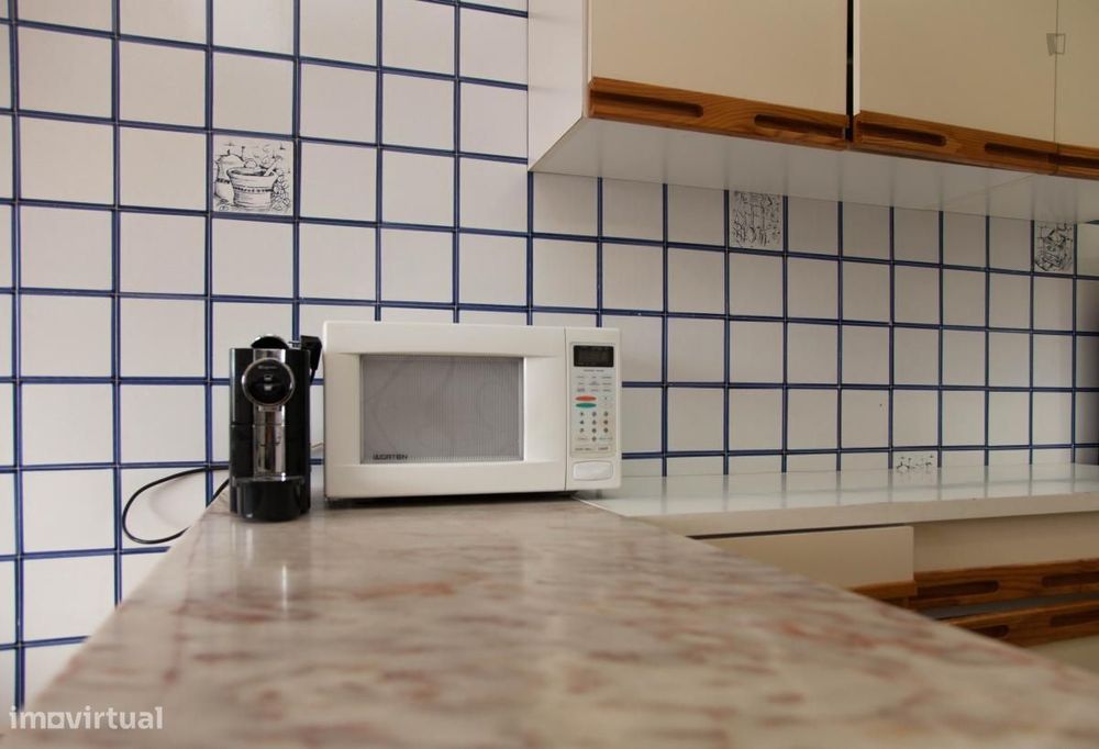 Quarto com cama de solteiro em apartamento com 4 quartos