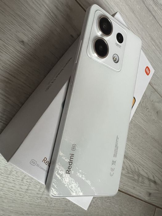 Redmi Note 13 5G w idealnym stanie na gwarancji.