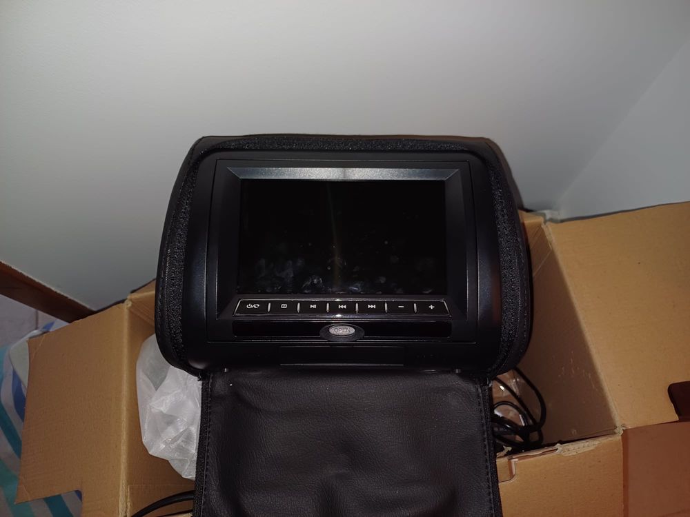 Encosto de cabeca com dvd universal