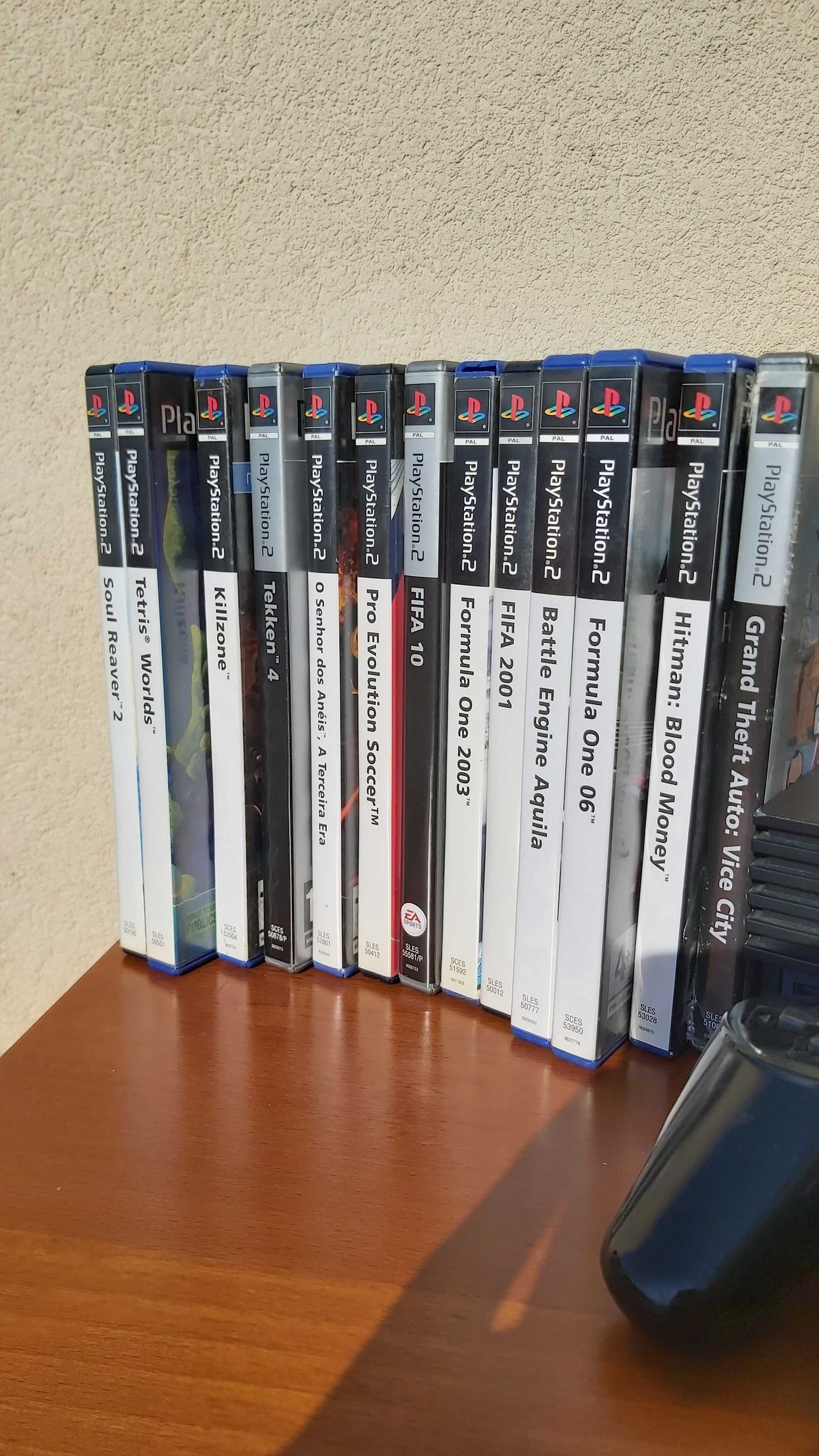 PlayStation 2 com 3 comandos e 14 jogos