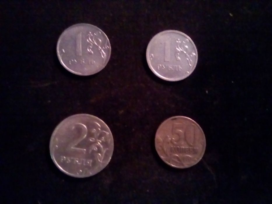 Монеты 2 рубля, 1 рубль, 50 копеек и 20 центов евро