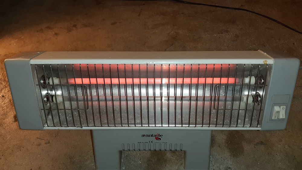 Aquecedor de barras antigo, mas a funcionar bem