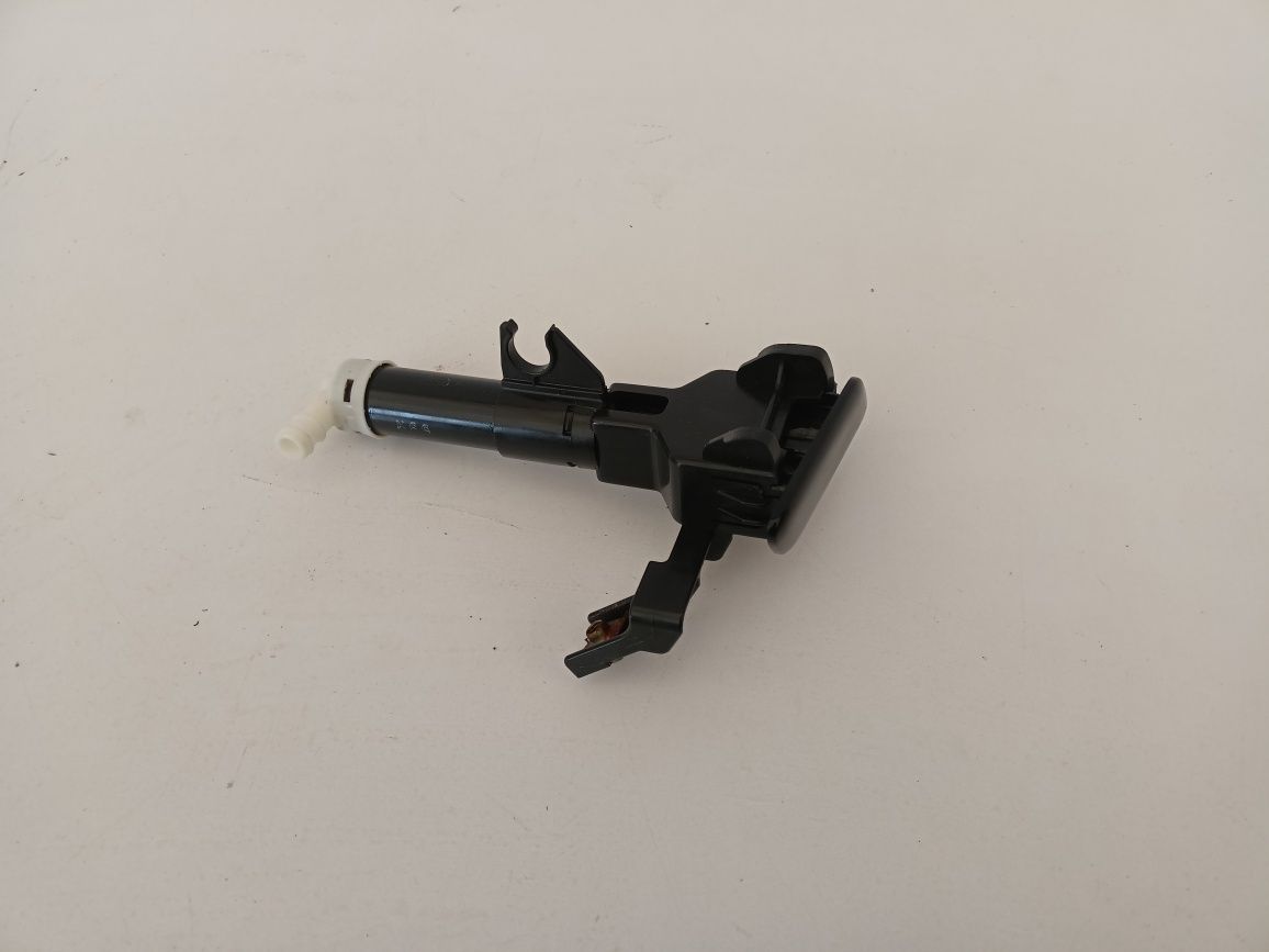 Toyota RAV4 III 3 lift FL 08-10 spryskiwacz sprysk prawy przód lampy