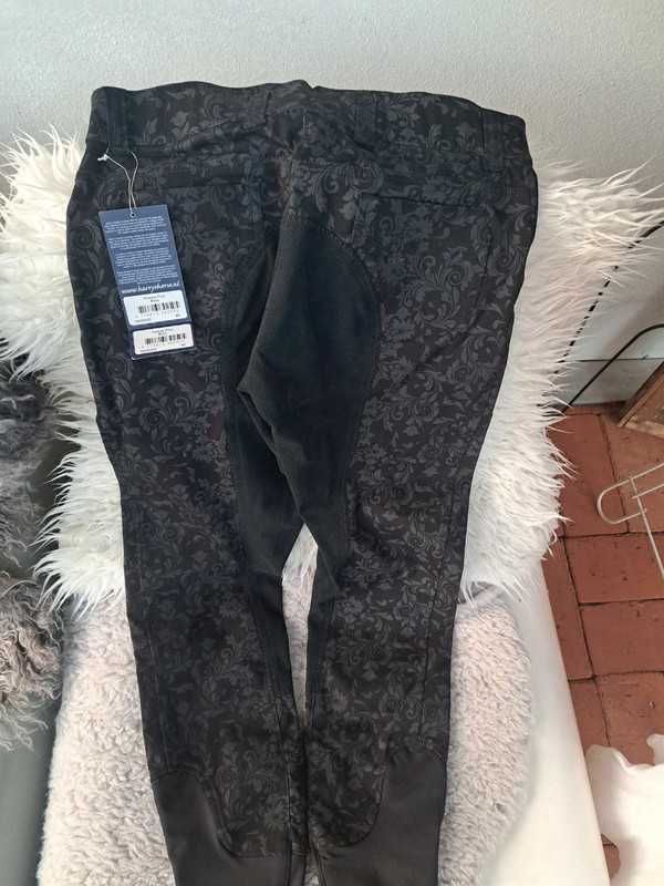 Bryczesy kwiatowy print nowe r.40