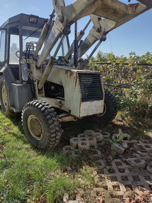koparko ładowarka komatsu fai