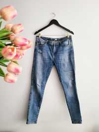 Spodnie jeansowe skinny wygodne elastyczne przetarcia dziury L