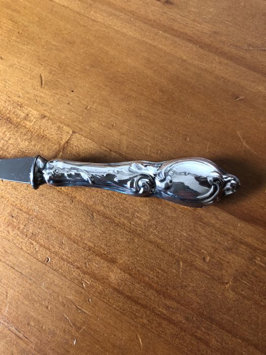 Colheres de bebe com cabo de prata