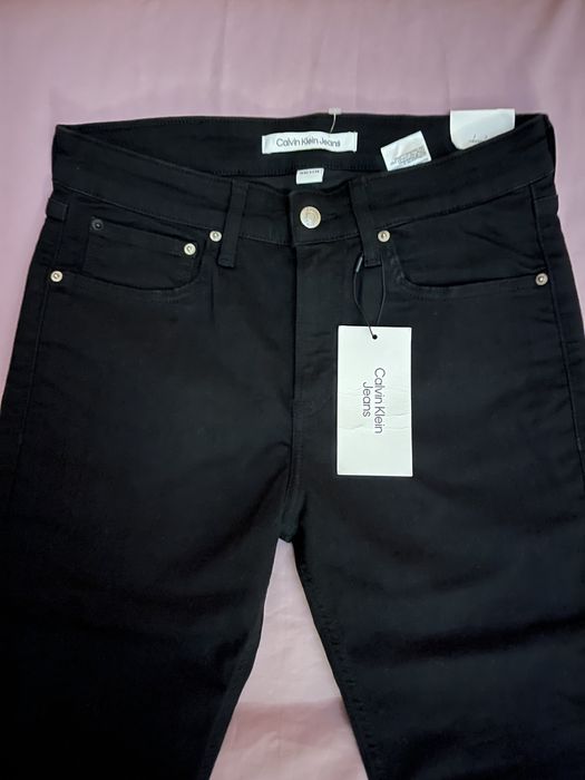 Wyprzedaż spodnie męskie Calvin Klein Jeans.