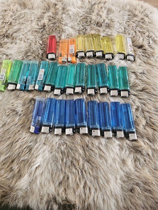 31 isqueiros de bolso