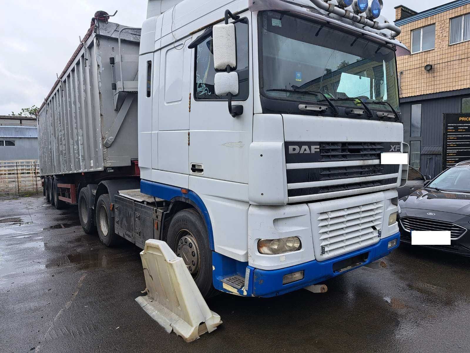 DAF XF 95 з лінивцем на спарці.