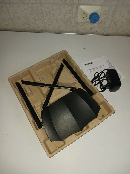 Роутер Тенда, новий