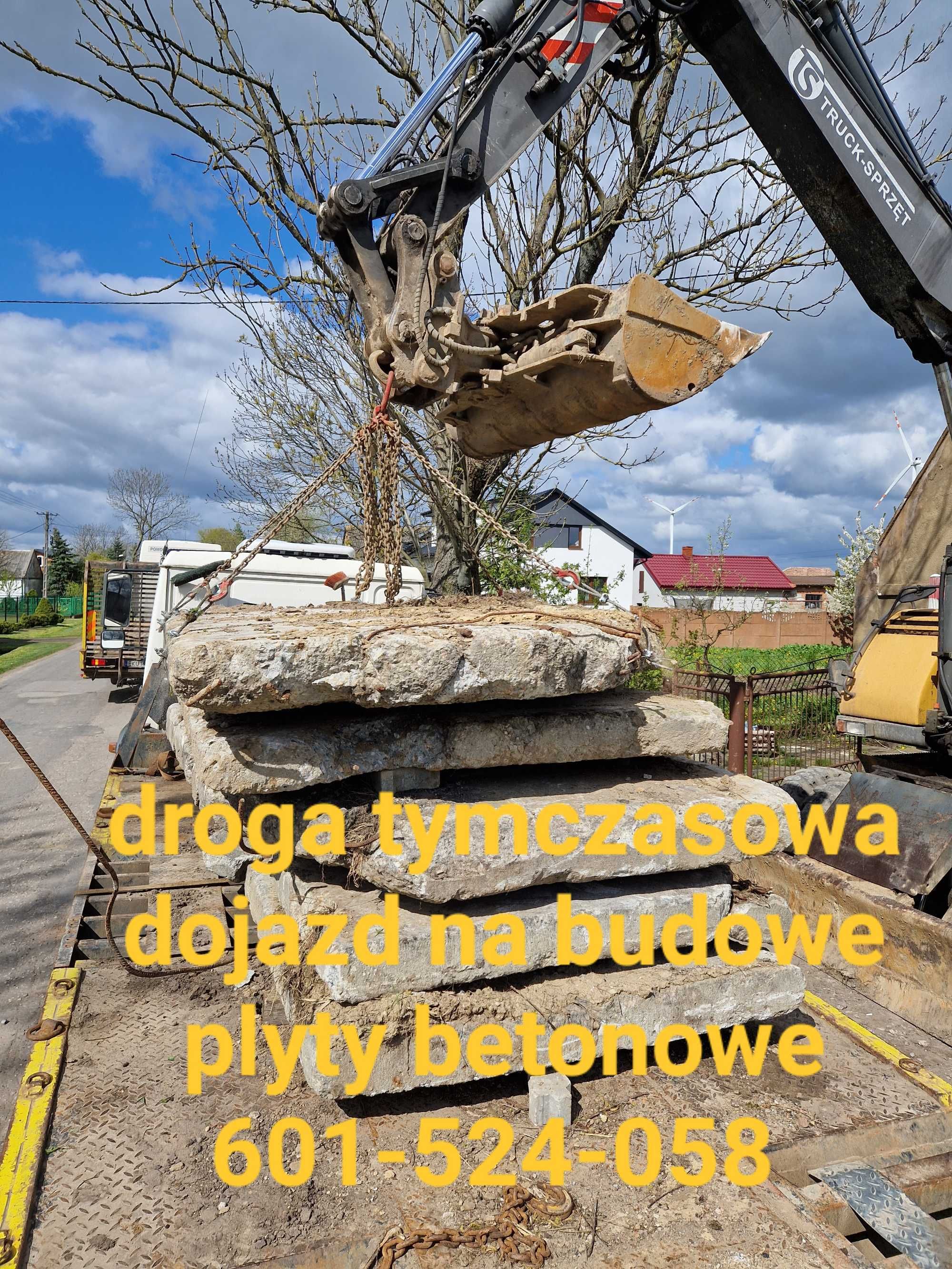 Droga tymczasowa dojazd na budowe plyty betonowe koparka transport