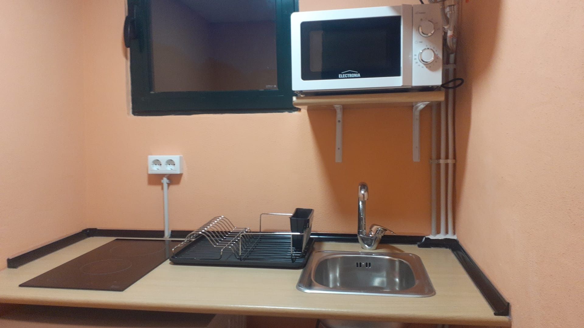 Quarto em casa de madeira