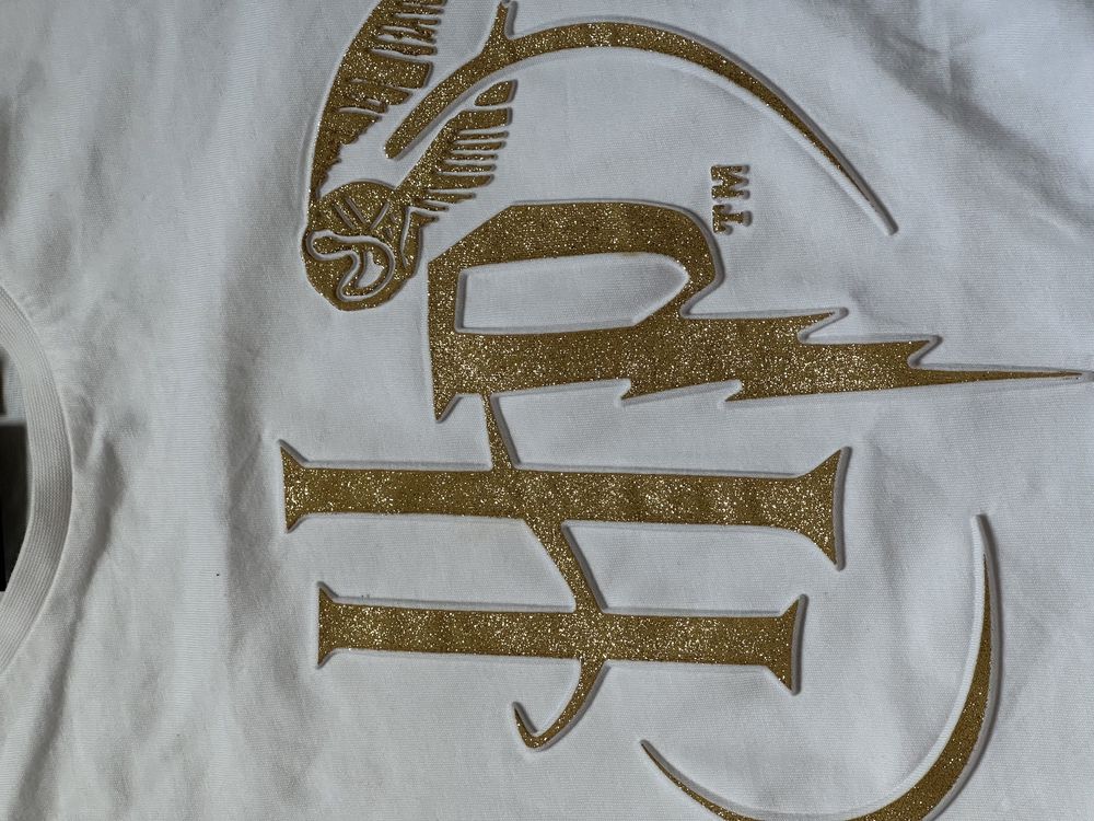 Rewelacyjny T-shirt Harry Potter z brokatowym znakiem 3D rozmiar 164cm