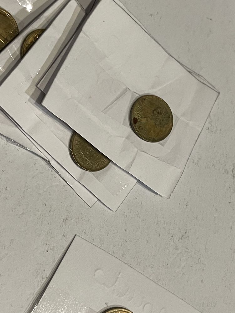 14 moedas de 1$ de varias datas