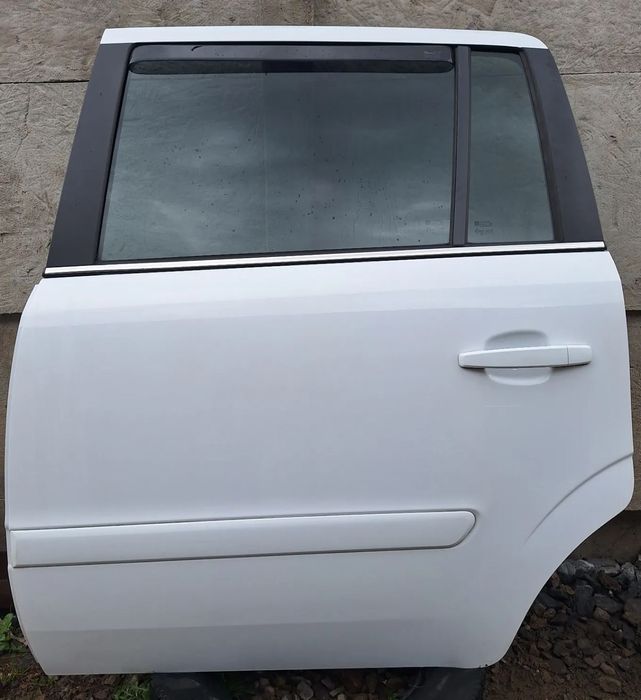 DRZWI KPL-LEWY TYŁ  - OPEL ZAFIRA B LIFT/ Z40R-BIAŁE