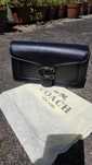 Mala coach em couro preto