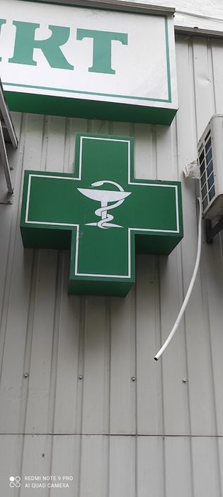 Вивіски і хрест для аптеки