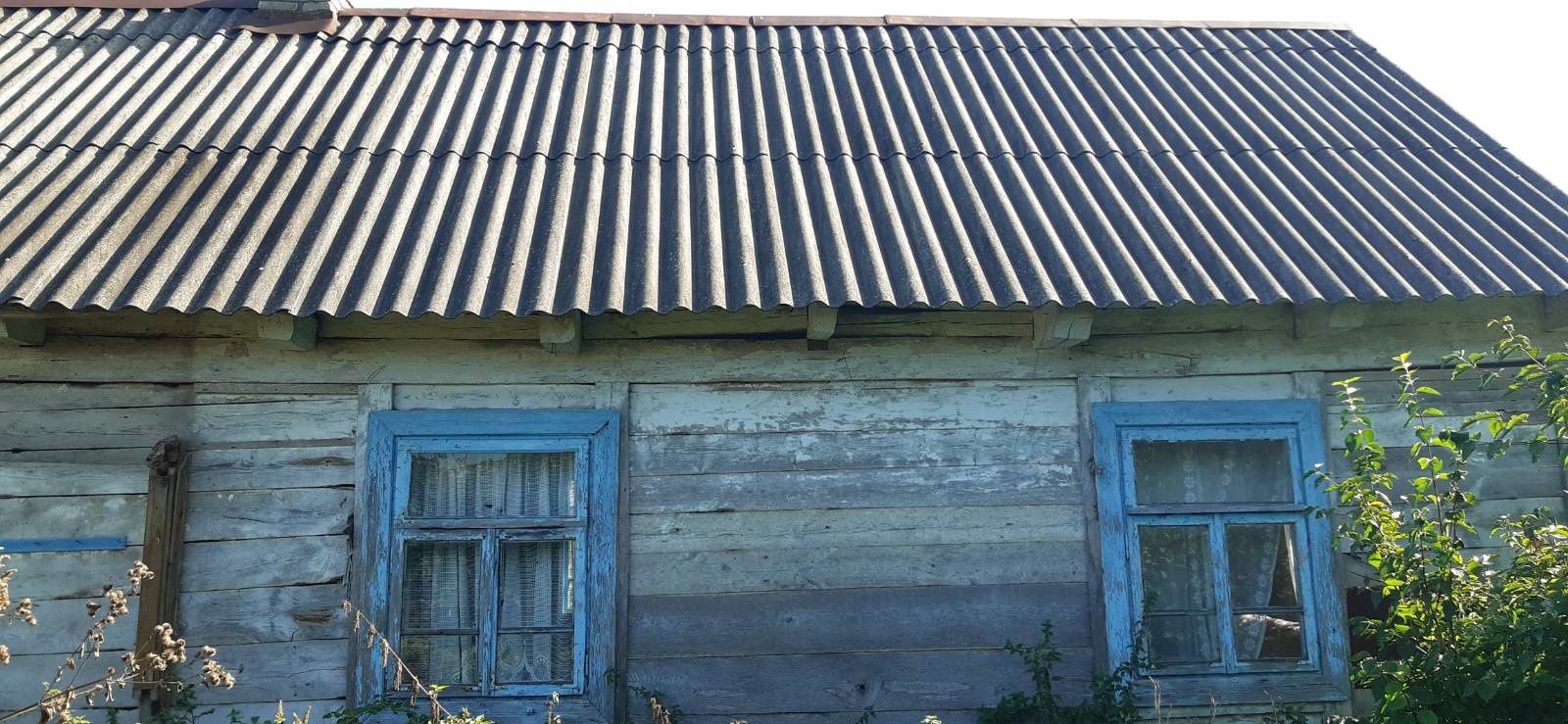 Дерев'яна хата на розбір