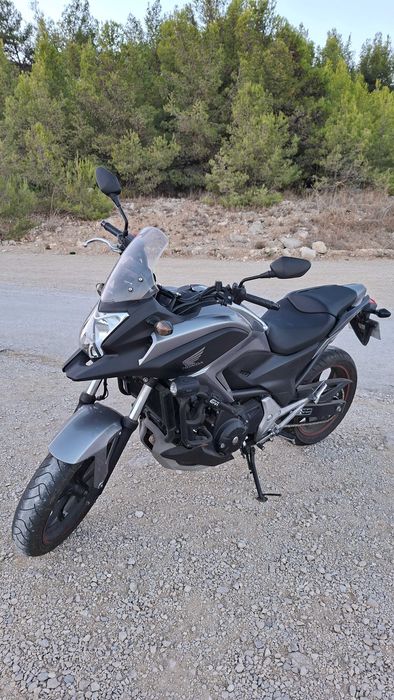 Mota Honda em excelente estado