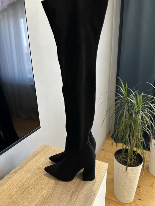 Ботфорди на підборах