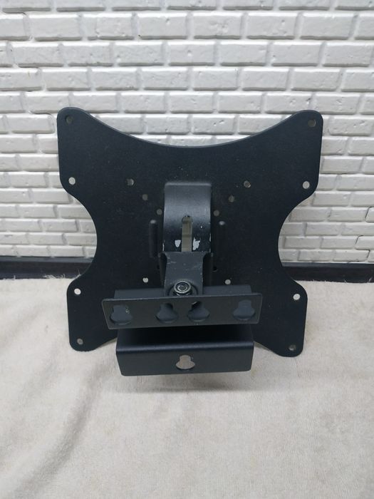 Настенное крепление для телевизора.