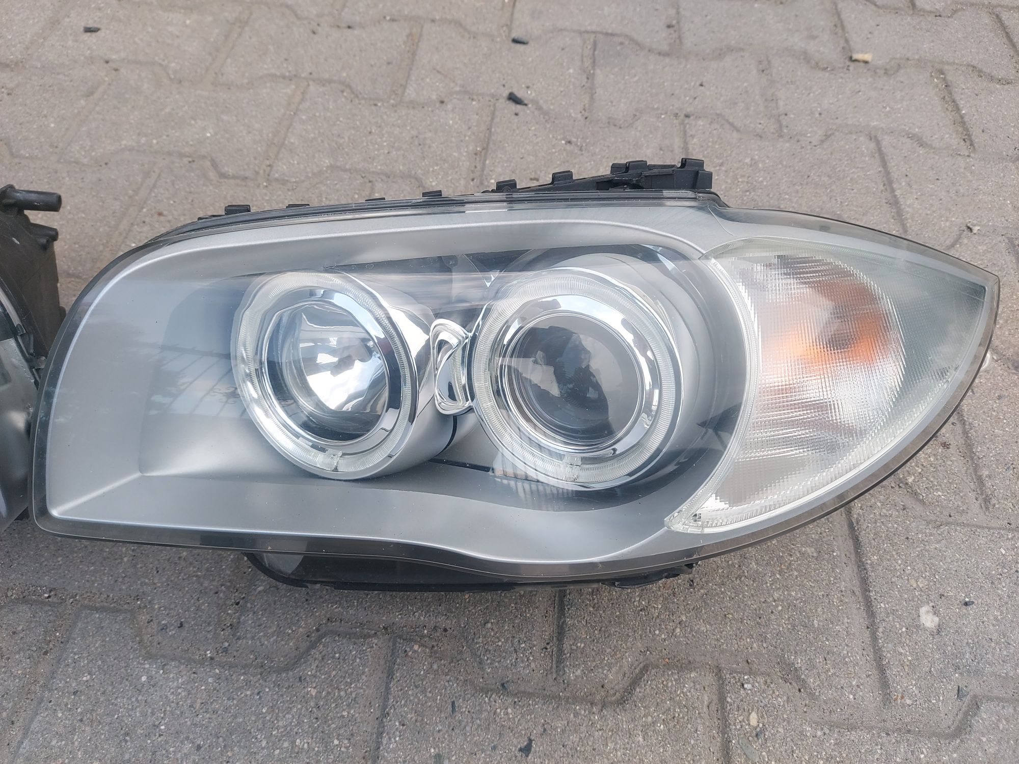 Lampa reflektor BMW E81 E82 E87 E88 przed liftem xenon prawa lewa EU