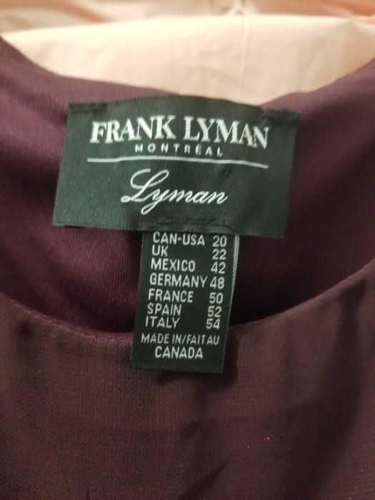 A beautiful purple gown by Frank Lyman! Tamanho XL