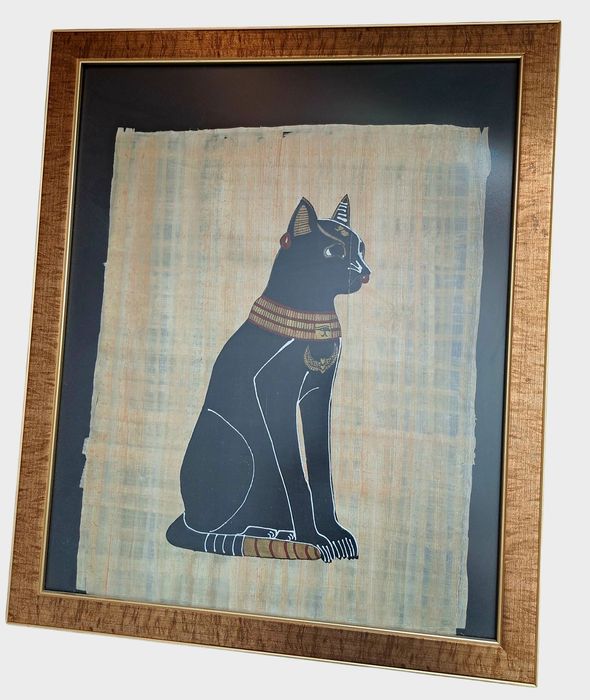 Papirus z egipską Bastet w ramie