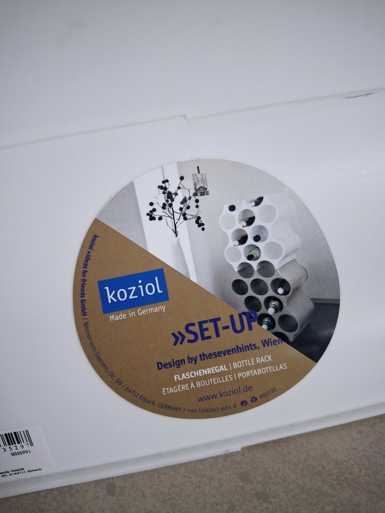 Stojak na butelki biały