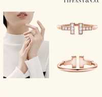 Золотое кольцо Tiffany & Co Love с бриллиантами.