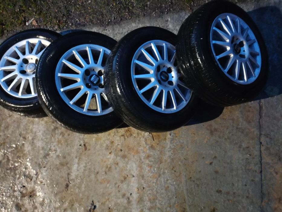 Nowe opony z alufelgami 185/60R14