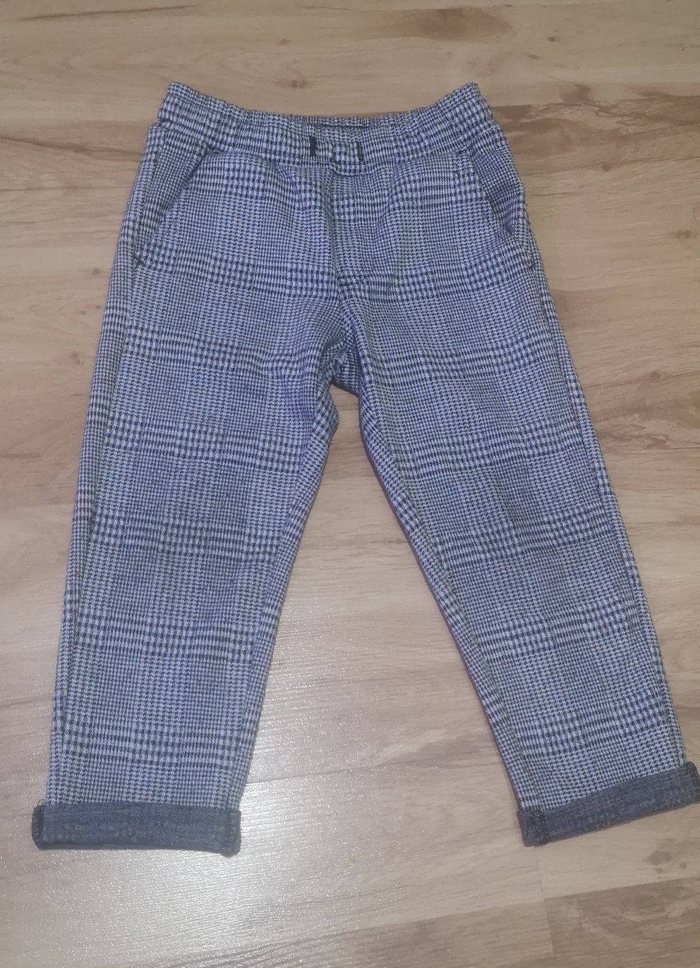 Spodnie materiałowe dla chłopca w kratkę Kappahl roz. 98
