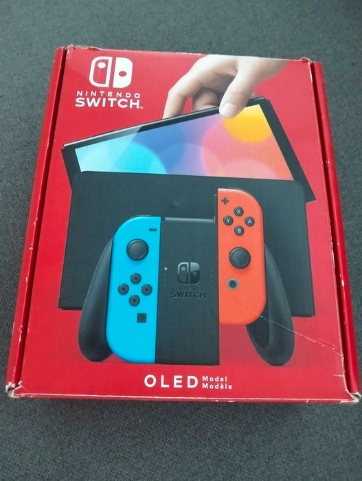 Nintendo Switch OLED + 2 gry + dodatkowy pad