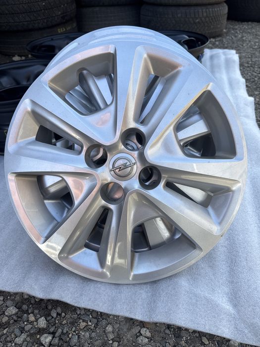 Felgi opel 6x15 ET 39 4x100 czyjniki cisnienia + kołpaki