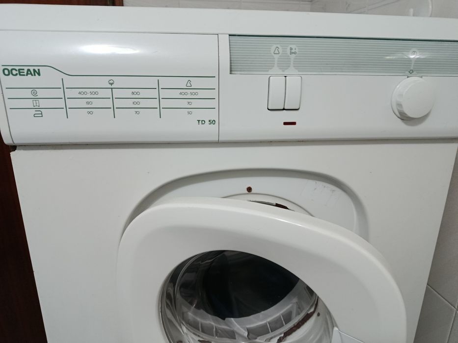 Máquina de secar roupa, usada