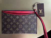 Skorzana kopertowka Louis Vouitton saszetka torebka logo