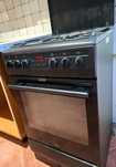 Kuchnia gazowo-elektryczna Amica 57GES2.33HZpTaA(Bm)