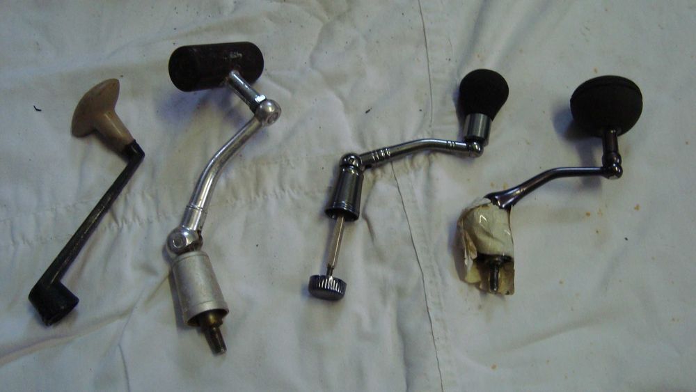 Material   para  pesca,  carretes  usados