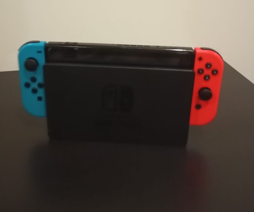 Nintendo switch + bolsa + comandos extra