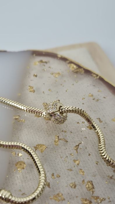 Nowy złoty charms stoper białe cyrkonie p. 585