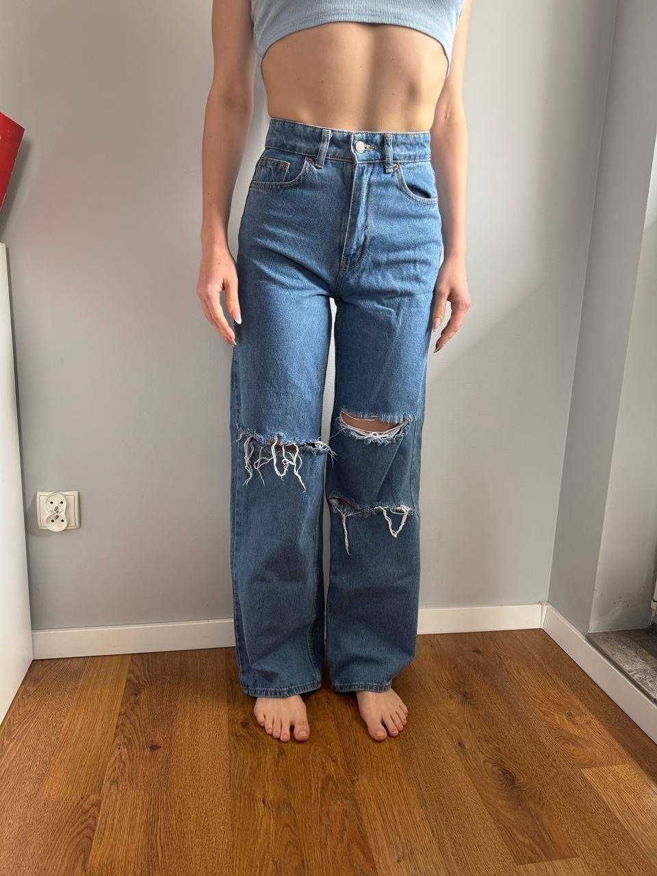 Damskie jeansy z dziurami