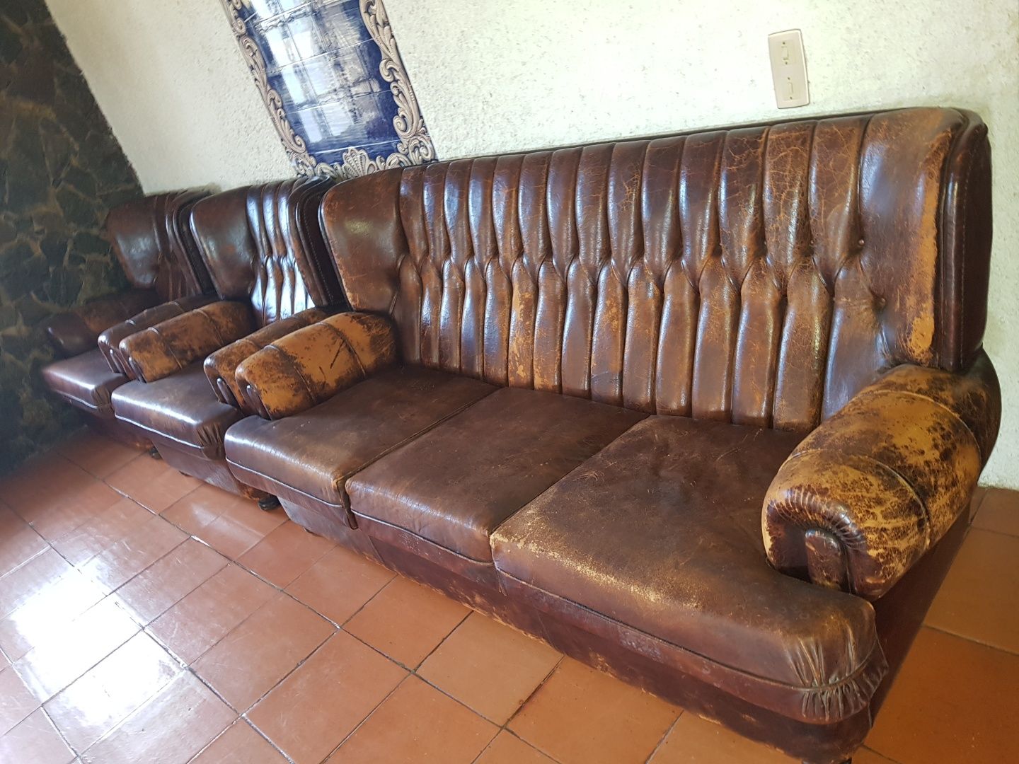 Conjunto de sofás em pele