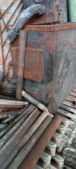 котел дровяной на два чугуна плита с кружками.